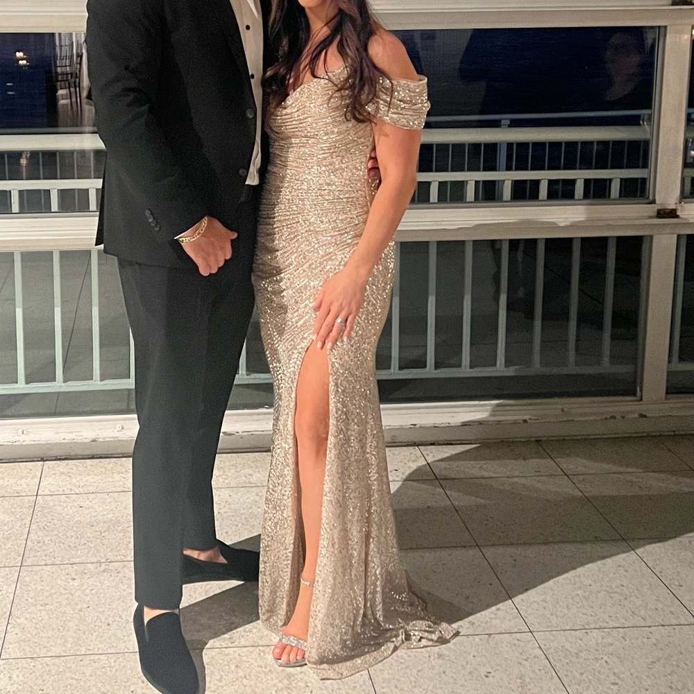 Platinum champagne, colored sequin gown with mermaid back. Size M